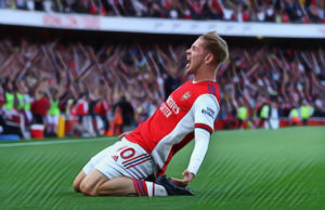 Smith Rowe celebrates after opening the scoring against Tottenham