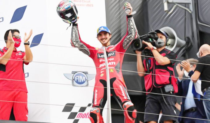 Bagnaia celebrates after winning in Misano